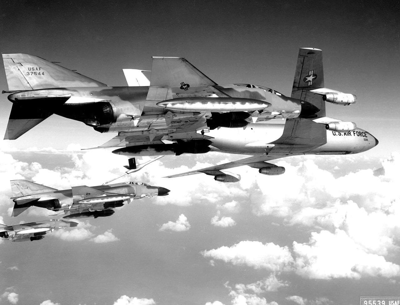 US Air Force F-4C Phantoms with external fuel tanks refuelling from a KC-135