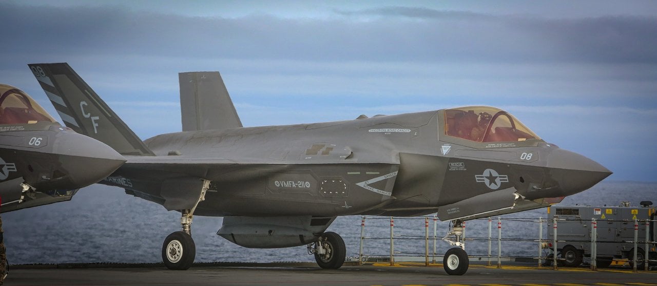 US Marine Corps F-35B of VMFA-211 with a GPU-9/A gun pod under its fuselage on the deck of HMS Queen Elizabeth