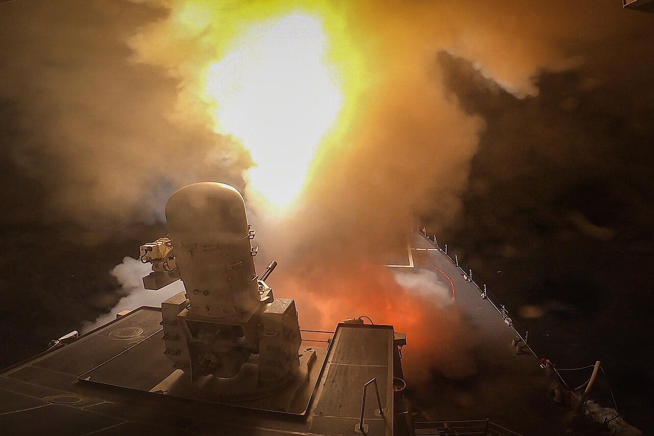 USS Carney launching interceptor missiles against Houthi missiles and drones in the Red Sea