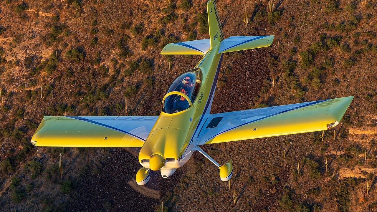 Van’s Aircraft RV-8 N283CB air-to-air over Arizona A yellow and blue Van's RV-8 homebuilt aircraft air-to-air over the Sonoran Desert