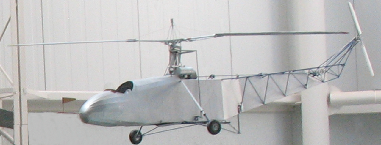 The restored Vought-Sikorsky VS-300 helicopter with its open tubular tail boom on display