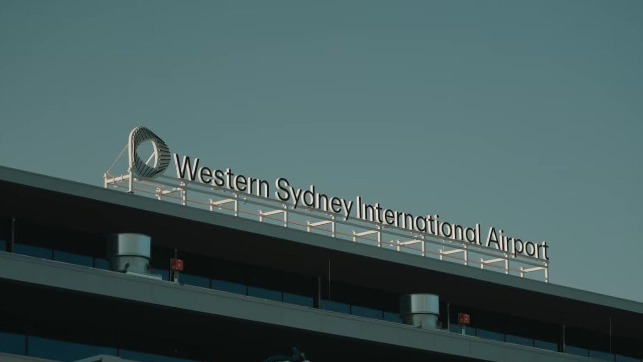 The Western Sydney International Airport sign on the roof of the passenger terminal