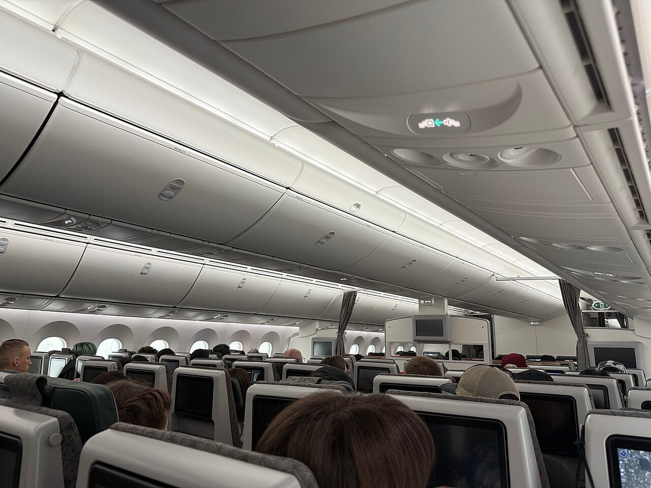 Boeing 787 economy cabin seen from a rear seat