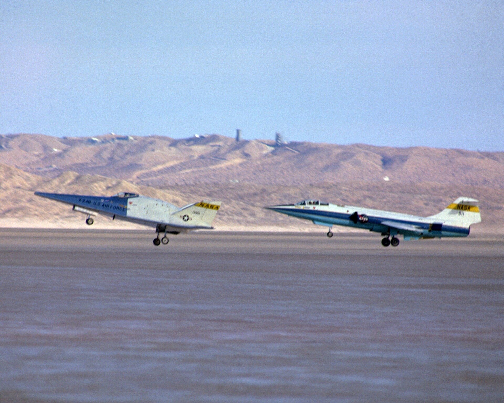 X-24B landing with an F-104N chase plane, 1975