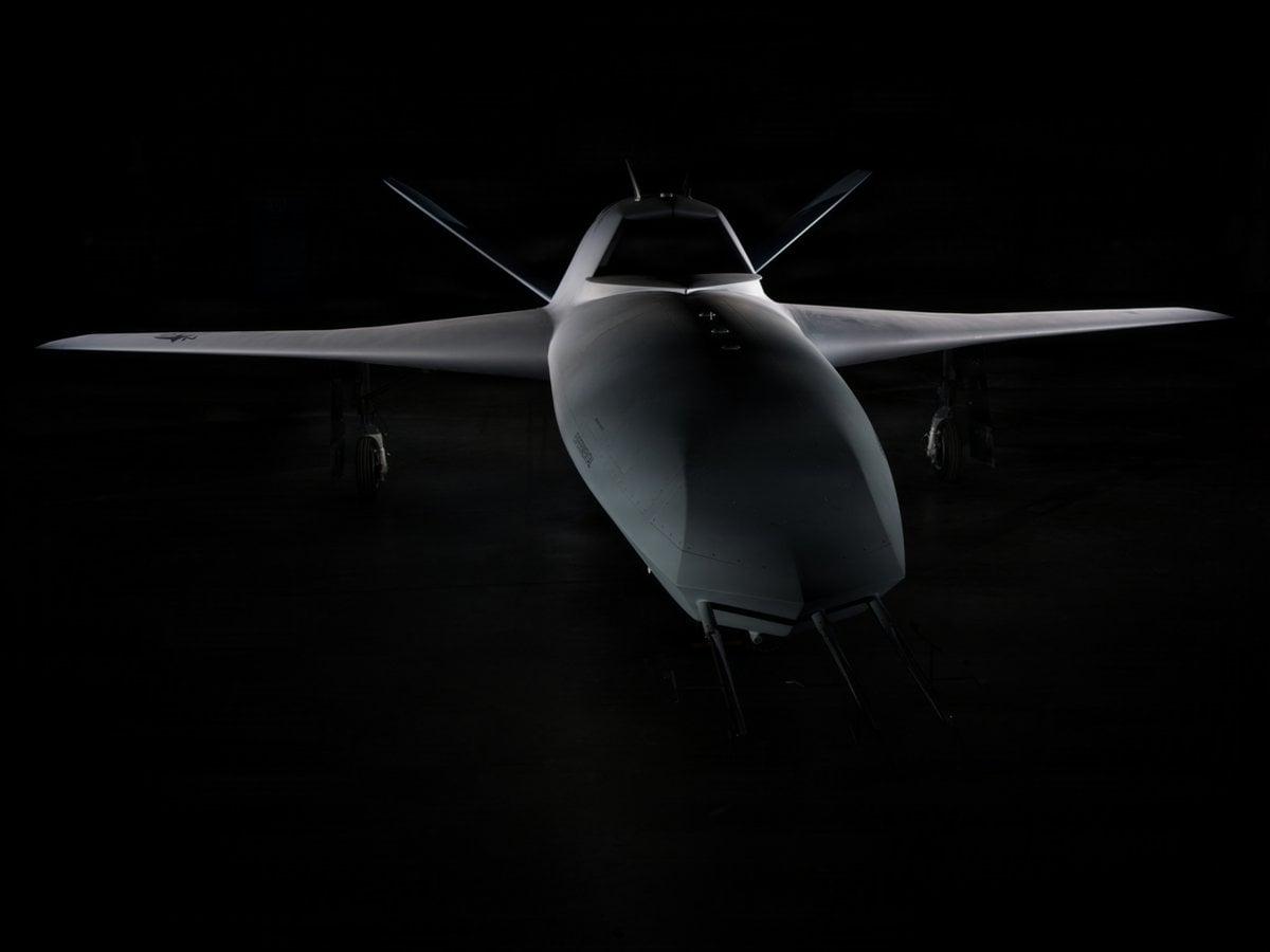 Northrop Grumman YFQ-48A Talon Blue drone wingman head-on in a hangar