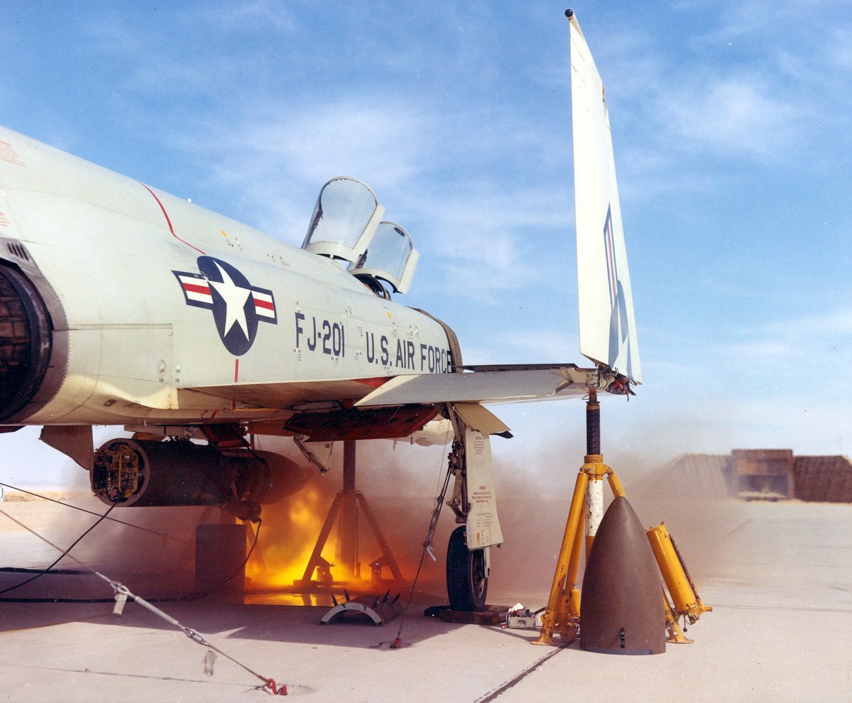 YRF-4C Phantom prototype firing a centerline gun pod during a ground test at Edwards Air Force Base