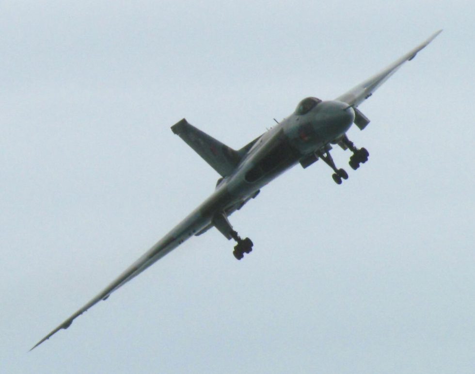 XH558 wheeling overhead at a British air show the vast triangular wing filling the sky.