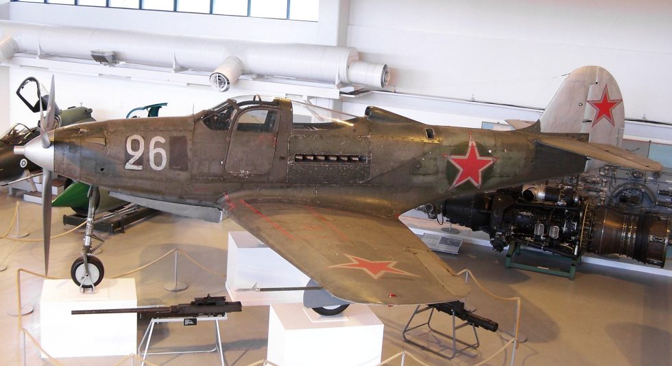 A Bell P-39 Airacobra in flight  the mid-engine fighter with a cannon in its nose.