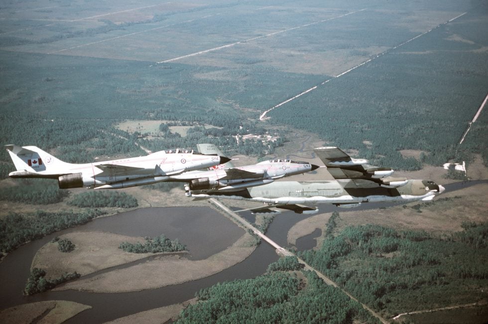 Two Canadian CF-101 Voodoos intercept a USAF B-52 in 1980  NORAD air defence in action.