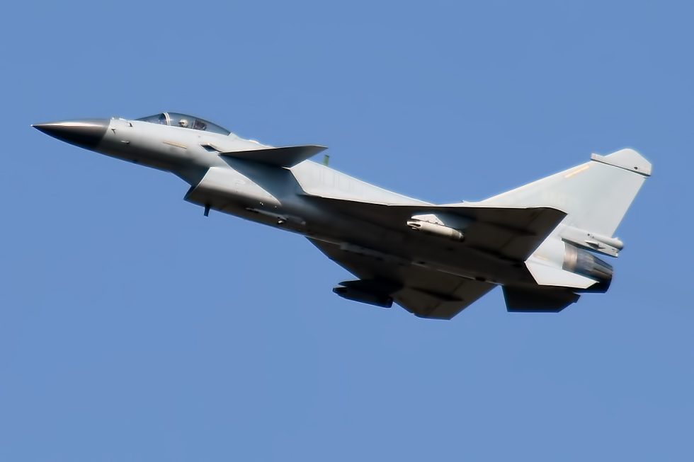 A J-10B in flight  note the reshaped diverterless intake under the nose.