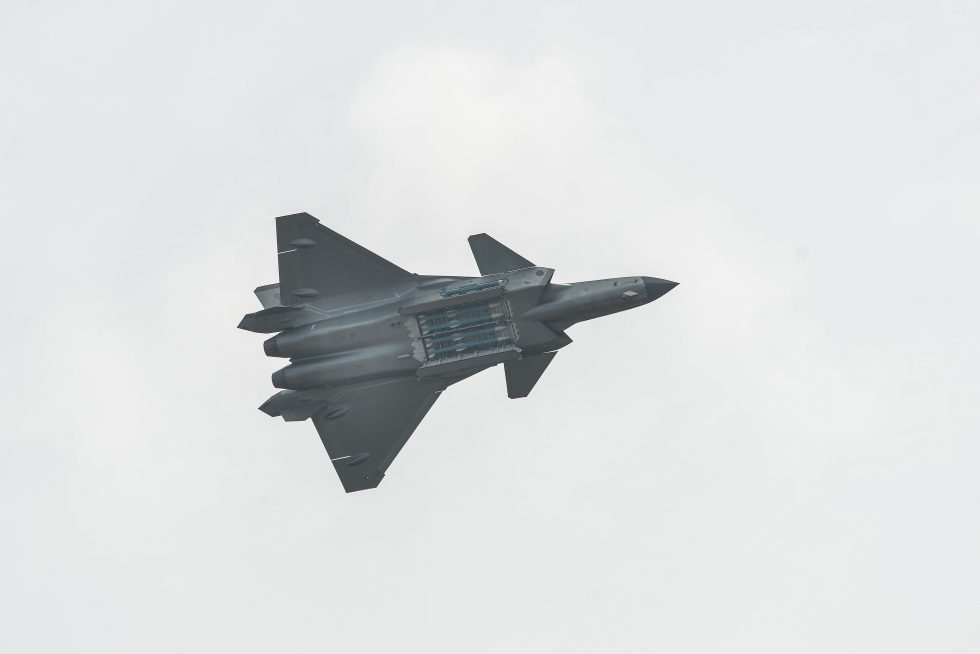 A J-20 in flight the canard-delta layout that sets it apart from every other fifth-generation fighter.