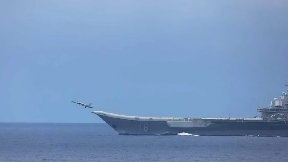 A Chinese carriers ski-jump bow the STOBAR ramp the baseline J-15 launches from.