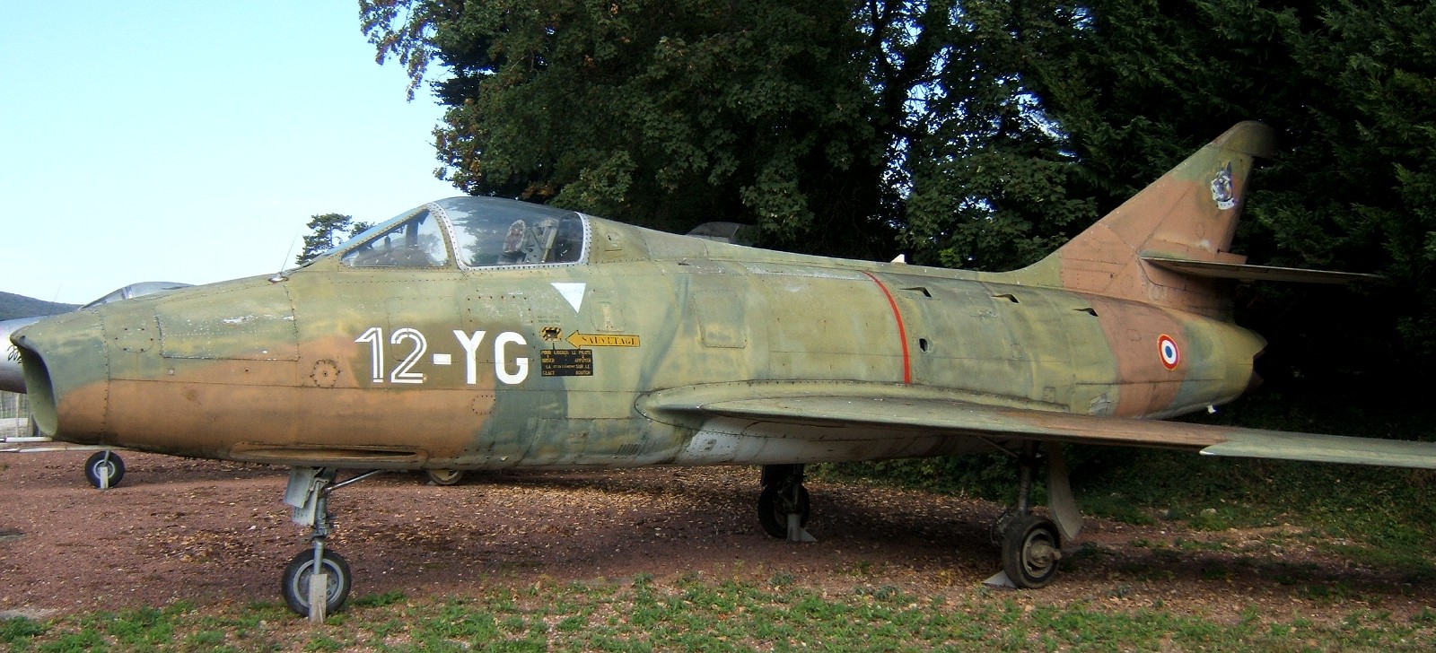 A Super Mystre B.2 in camouflage the thin swept wing and single Atar intake are clear.