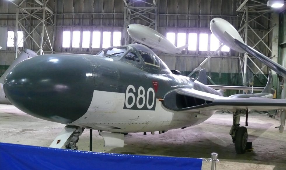 A preserved de Havilland Sea Venom in Fleet Air Arm markings at the Museum of Flight  folding wings and a tailhook mark it as a naval jet.
