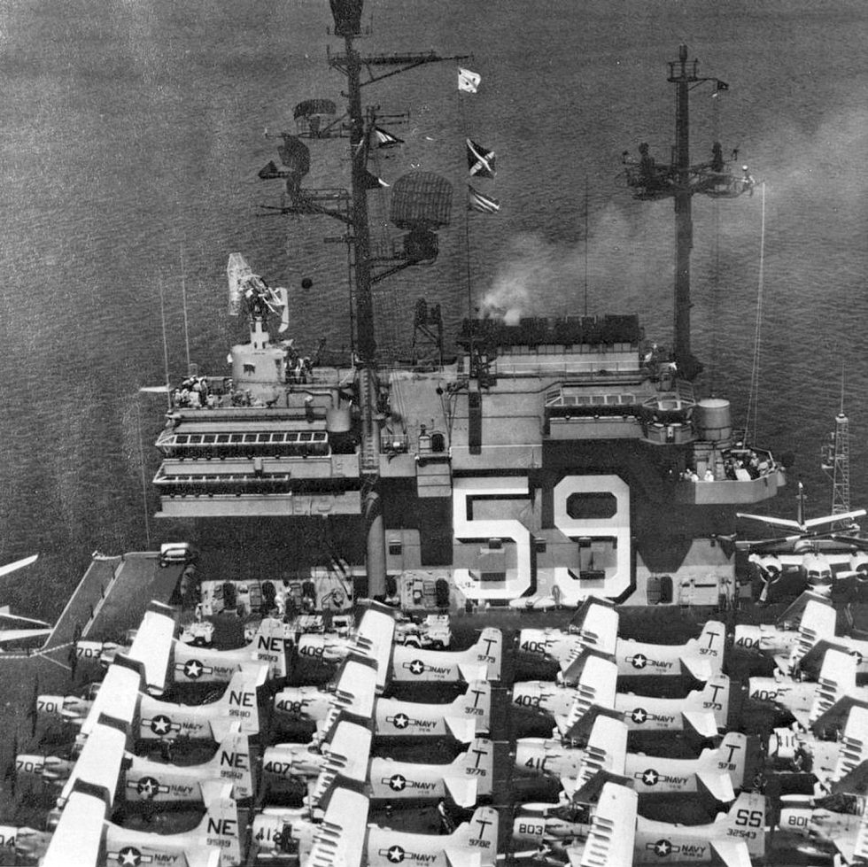 Sixteen AD Skyraiders crowd the deck of USS Forrestal in 1957  the Navys carrier attack backbone.