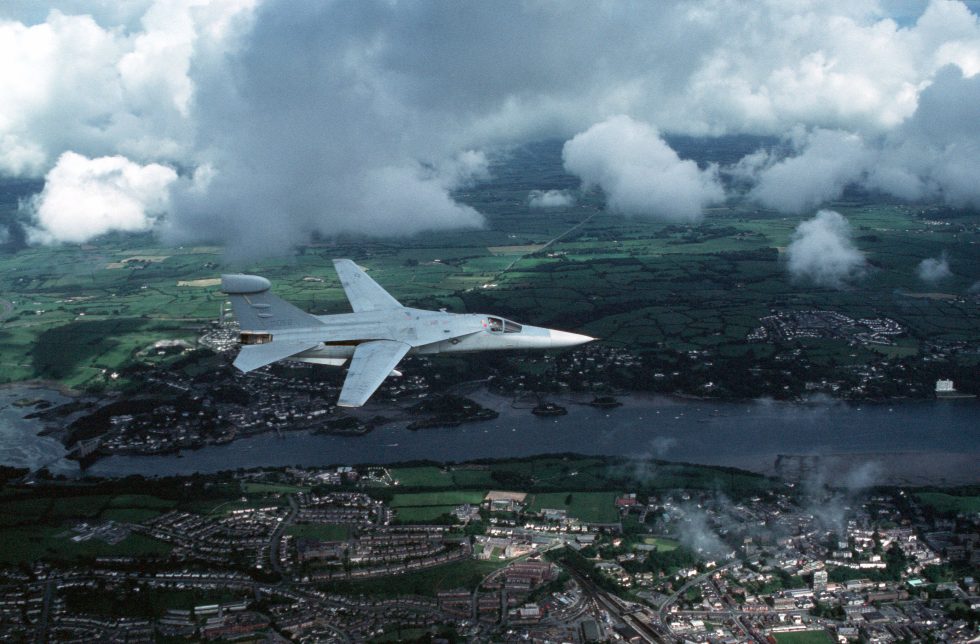 An EF-111A Raven with wings fully spread the electronic-warfare jammer version of the Aardvark.