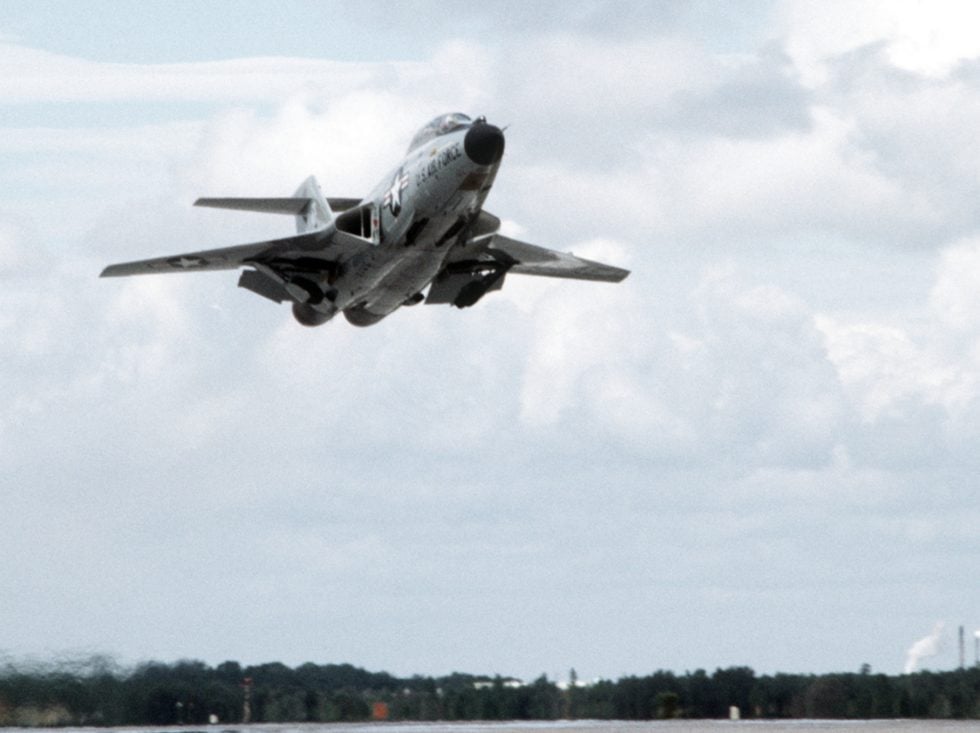 An F-101B Voodoo lifts off from Tyndall AFB in 1980 on its two afterburning J57 engines.