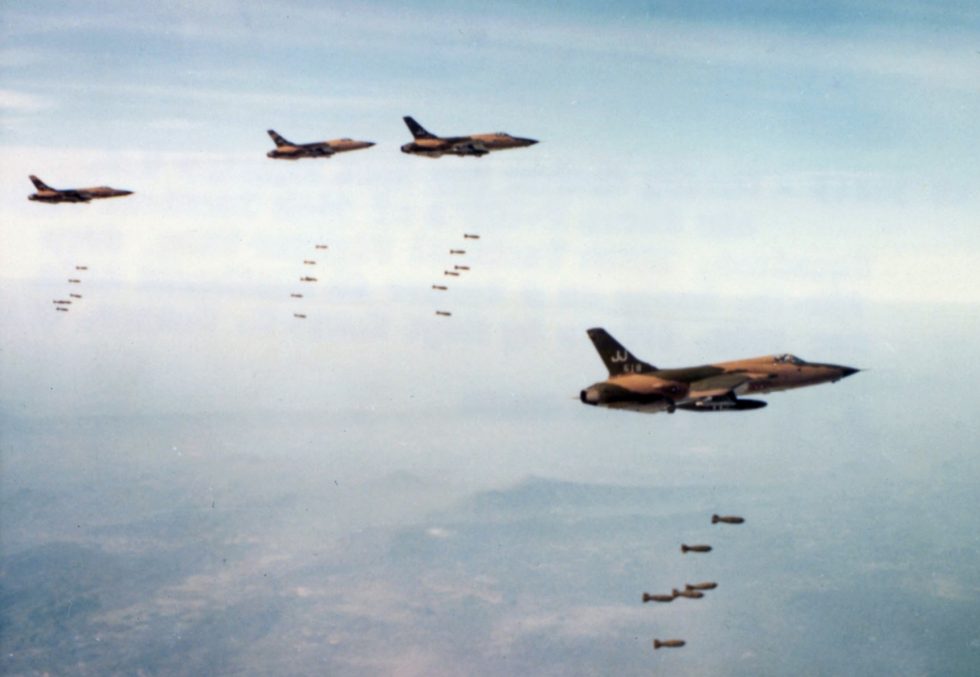 F-105Ds salvo their bombs over North Vietnam  the Thuds daily work in the strike role.
