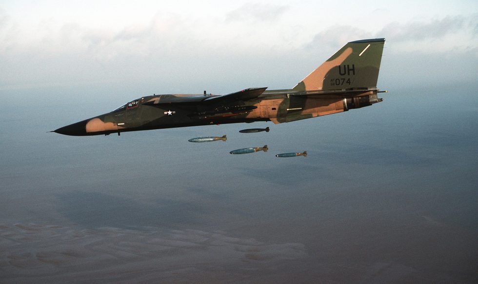 An F-111 of the 20th Tactical Fighter Wing releases four bombs over a range the bomb load of four Phantoms.