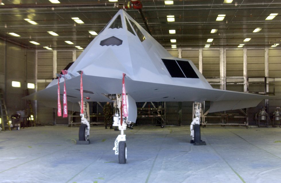 An F-117 in an experimental light-grey scheme  a rare Nighthawk in Raptors clothing.