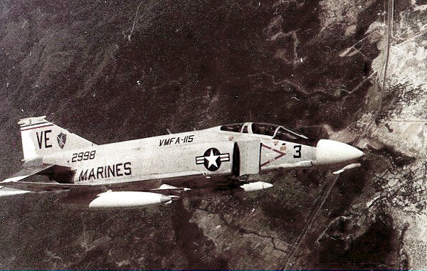 A US Marine Corps F-4B of VMFA-115 in flight over Vietnam, December 1969.