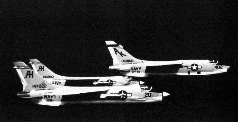 A pair of F-8C Crusaders of VF-111 with an RF-8G reconnaissance Crusader, 1967.