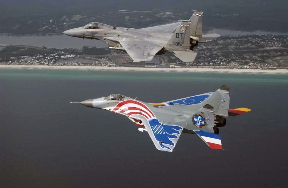 A German Luftwaffe MiG-29 formates with a USAF F-15C  the type that shocked NATO after reunification.