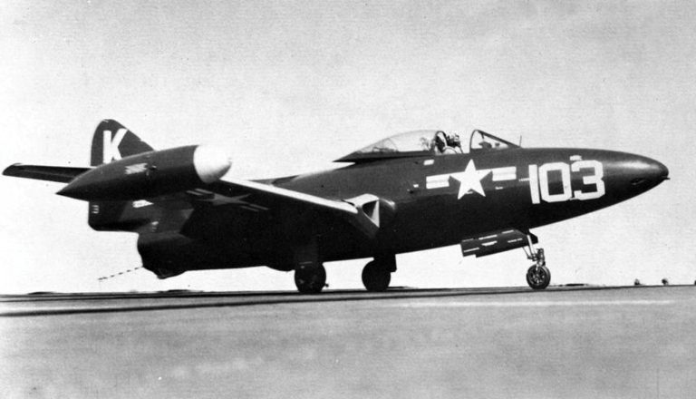A VF-31 F9F-2 Panther recovers aboard USS Leyte off Korea, around 1950.