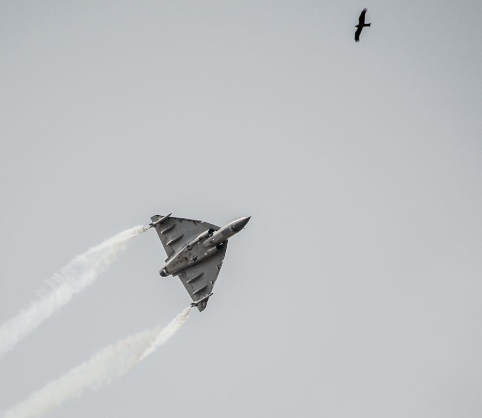 A Tejas formating with a larger fighter  a sense of just how small it is.
