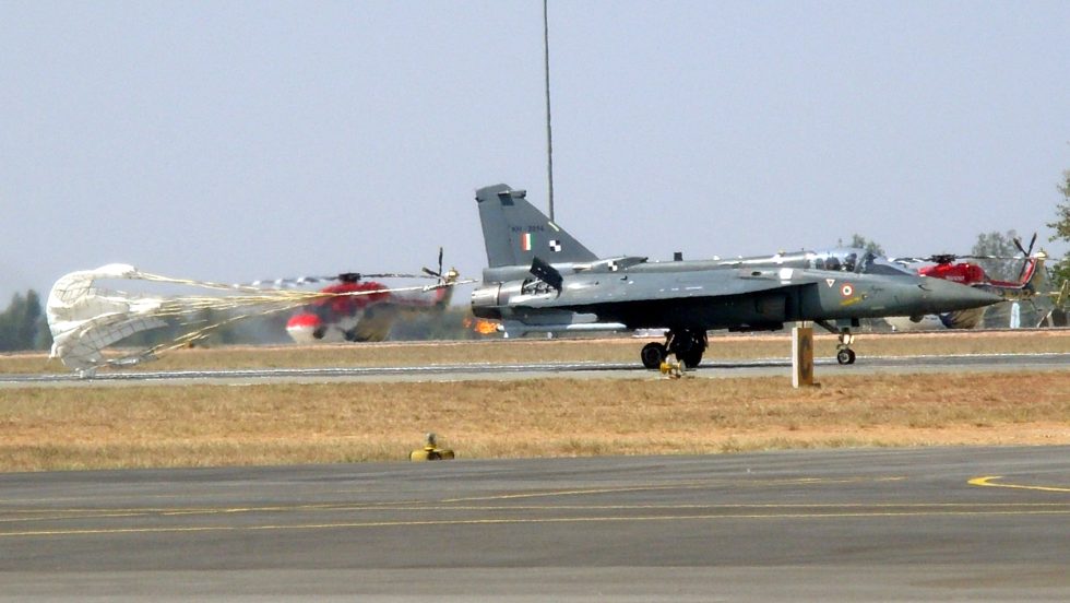 An IAF Tejas on approach at Aero India 2013, airbrakes and gear down.