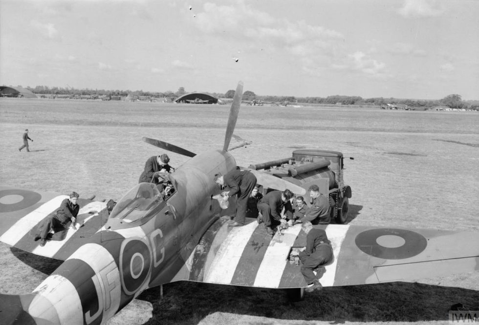 Ground crew refuel and re-arm a Tempest V of No. 3 Squadron at Newchurch during the V-1 battle.