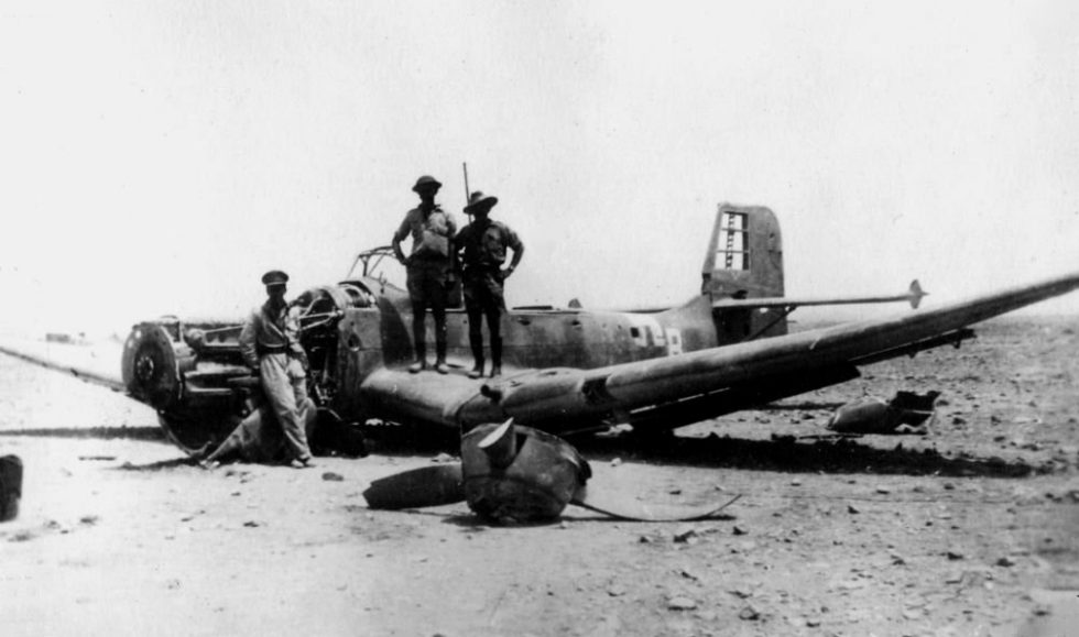 Troops and ground crew beside a Stuka, 1942  by now the type was increasingly vulnerable.