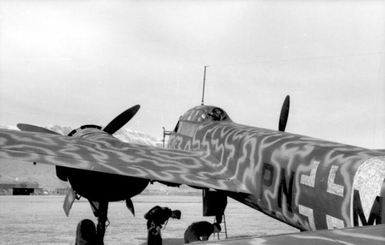 A camouflaged Ju 88 in Italy the type served widely in the Mediterranean theatre.