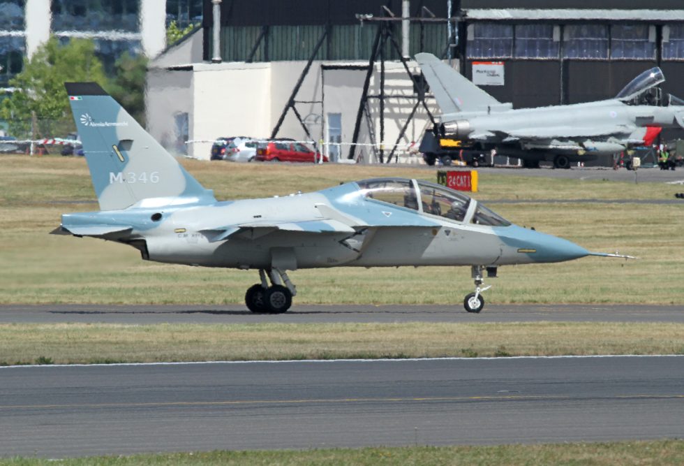 An M-346 taxis past a Eurofighter Typhoon  the Master is a lead-in trainer for exactly this generation of fighter.