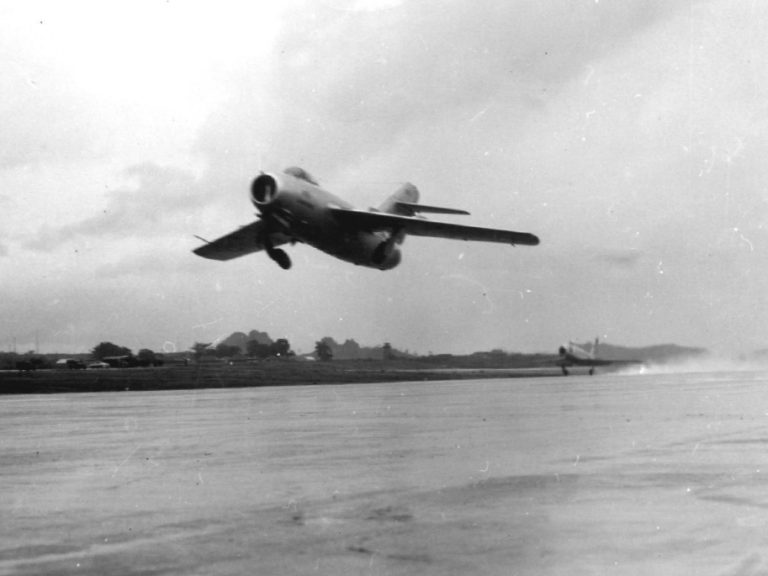 A MiG-15 and an F-86 Sabre take off together at Okinawa, 1953 the great jet rivals side by side.