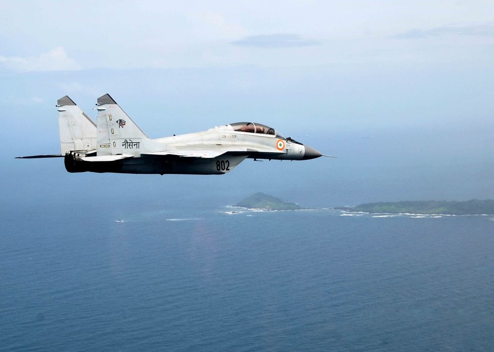 A navalised MiG-29K of the Indian Navy  folding wings, reinforced gear and an arrestor hook.