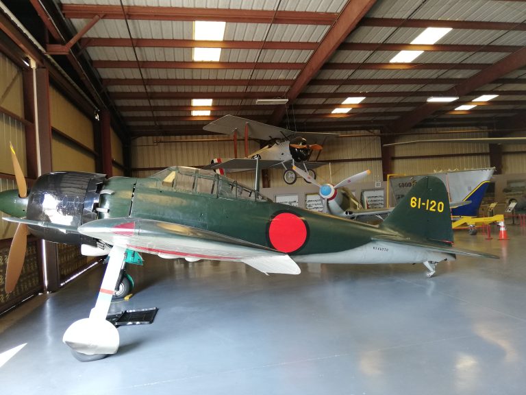 A preserved A6M Zero on museum display, wearing Imperial Japanese Navy markings.
