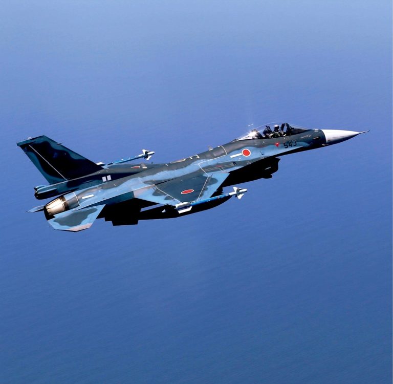 A lone F-2 over the sea in its ocean-blue maritime camouflage  the colours of its anti-ship mission.