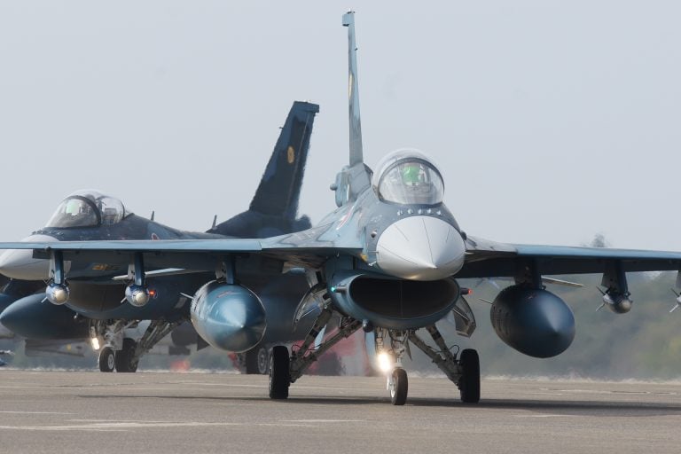 An F-2 taxiing with external tanks  a single F110 turbofan gives it near-Mach-2 speed.