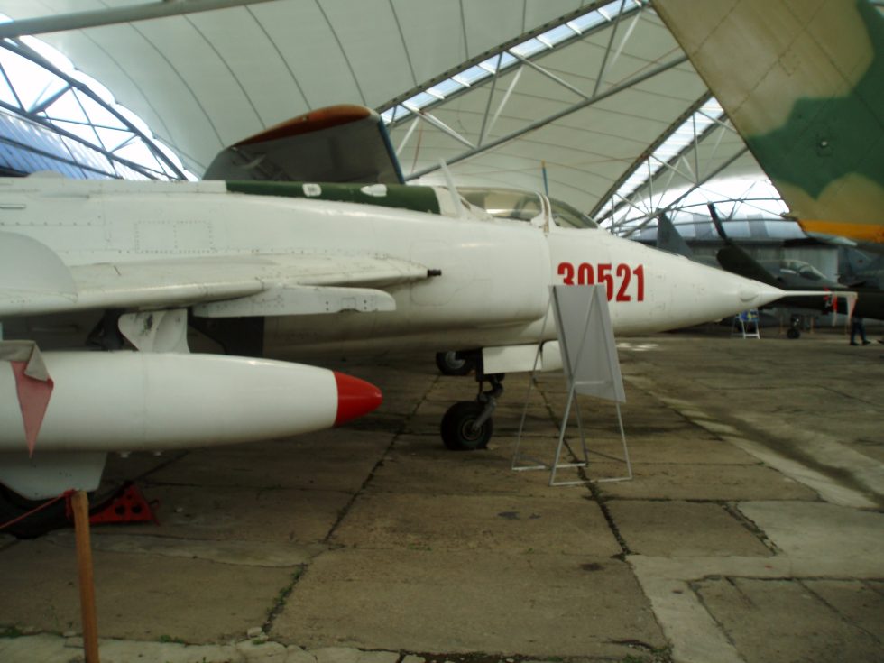A preserved Nanchang A-5 at the Museum of Aviation in Koice  the twin side intakes and solid nose that mark the MiG-19 redesign.