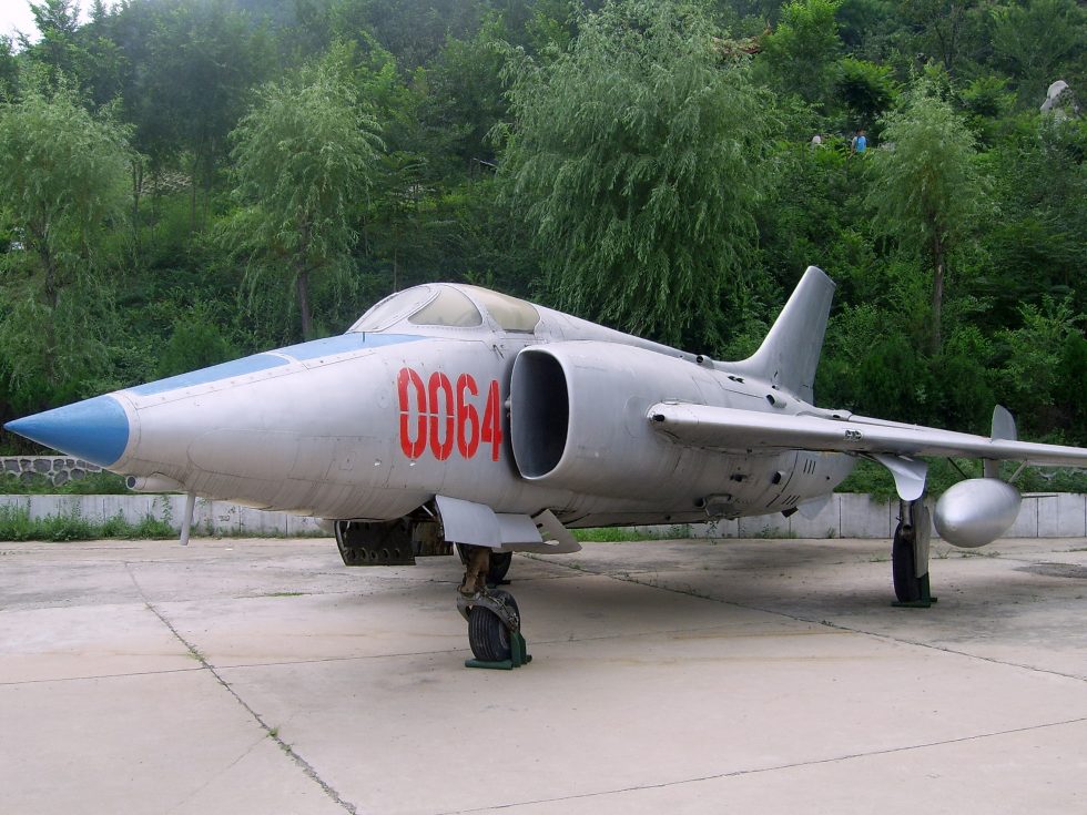 The Fantans signature look: a solid pointed nose for avionics and twin semicircular side intakes replacing the MiG-19s nose inlet.