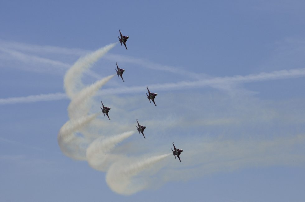 Five F-5E Tiger IIs of the Swiss Patrouille Suisse banking in formation.