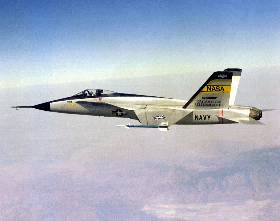 A YF-17 banking away in flight  the leading-edge extensions and twin engines that defined its high-alpha agility are clearly visible.