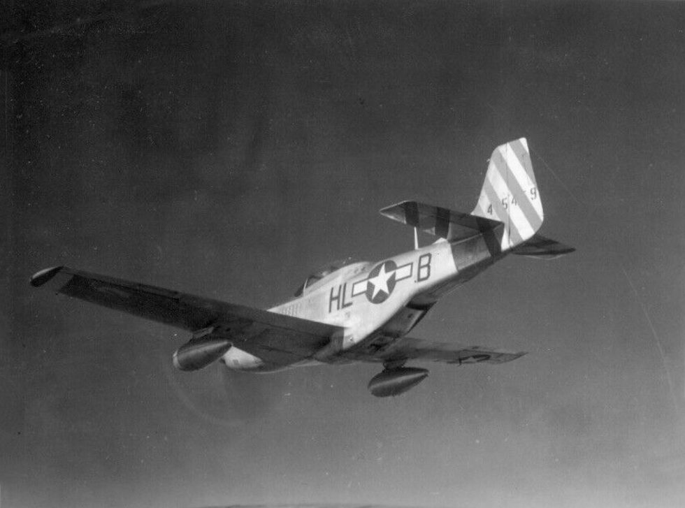 American Beauty  Capt. John J. Volls P-51D of the 31st Fighter Group over Italy, 1944.