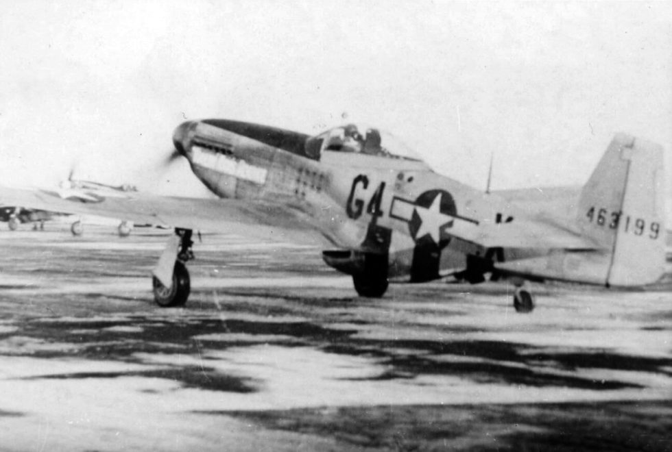 A P-51D Mustang of the USAAF 362nd Fighter Squadron in France, 1944  wartime invasion stripes and Eighth Air Force markings.