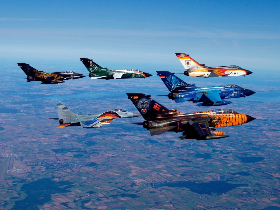 Panavia Tornados in formation  wings spread for slow flight, showing the variable-geometry hinge.