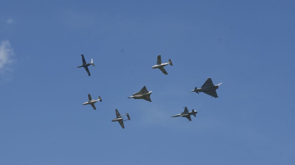 The Tunnan in flight  the swept wing and barrel fuselage clear against the sky.
