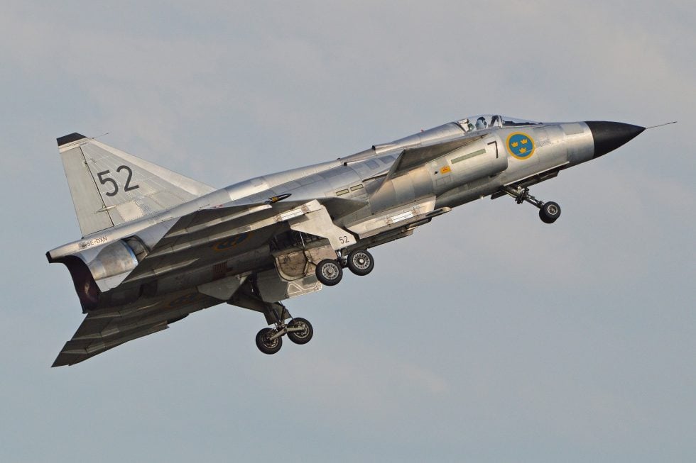 A Saab AJS 37 Viggen airborne  the canard foreplane and broad delta that defined its shape.