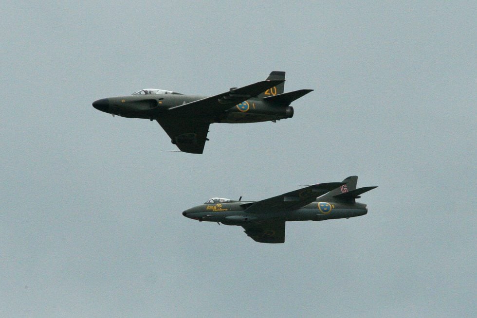 A J32E Lansen flying in formation with a Hawker Hunter at Malmen in 2012, the types final year in the air.