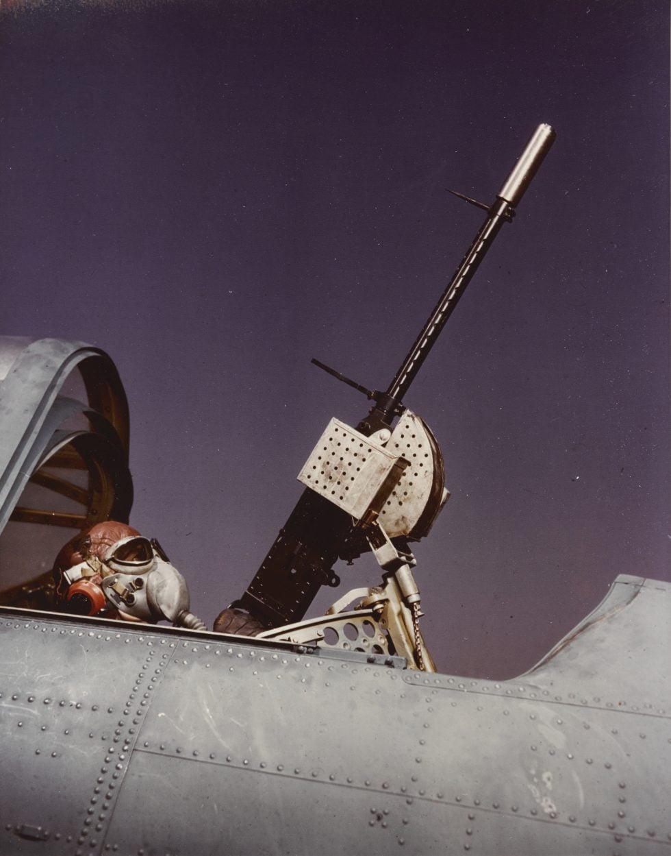 The radioman-gunner mans his flexible rear machine guns, around 1942.